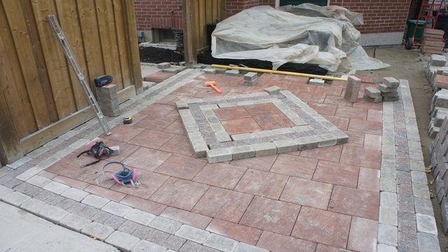 Paving stones being installed